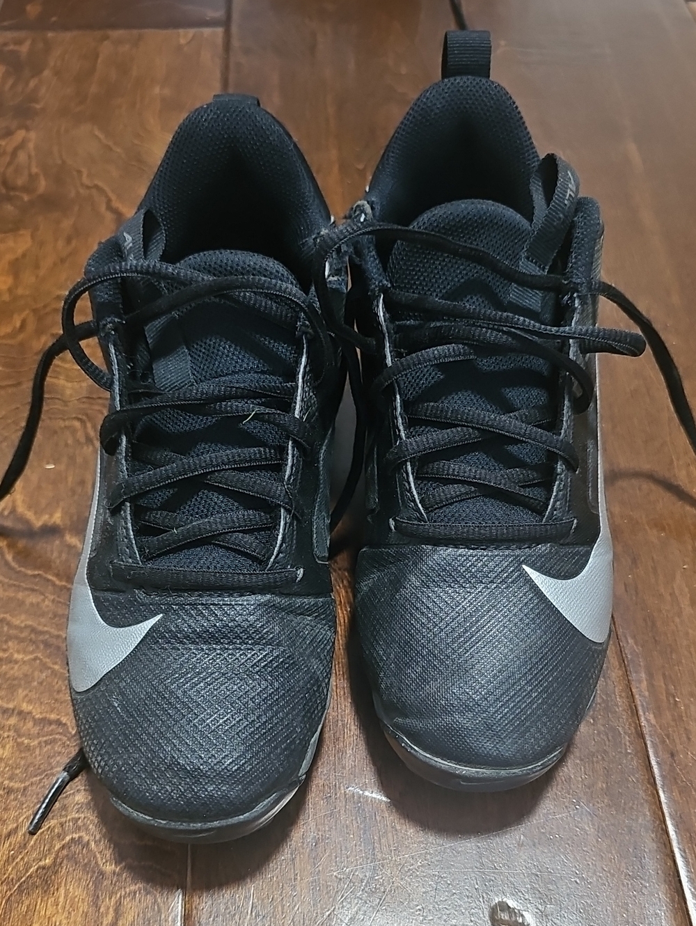Nike Boy Sz 4.5Y Black Football Cleats with Silver Swoosh